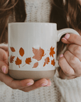 Orange Leaves 14oz. Cream Stoneware Coffee Mug