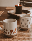 Orange Leaves 14oz. Cream Stoneware Coffee Mug