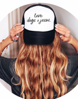 Love dogs + Jesus trucker hat