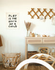 play is the work of a child banner