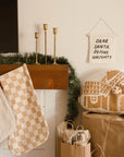 dear santa, define naughty hang sign