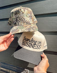 Standing On Business Trucker Hat