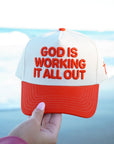 God Is Working It All Out - Red Trucker Hat