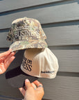 Standing On Business Trucker Hat