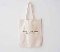 Keep Your Eyes On Jesus Market Tote Saved by Grace Co.