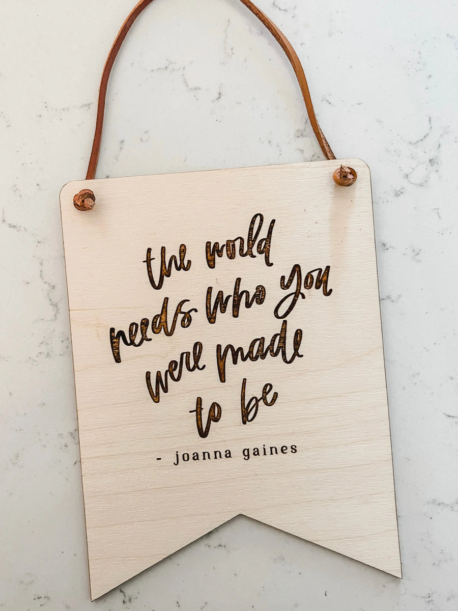 The Worlds Needs Hanging Banner Sign Saved by Grace Co.